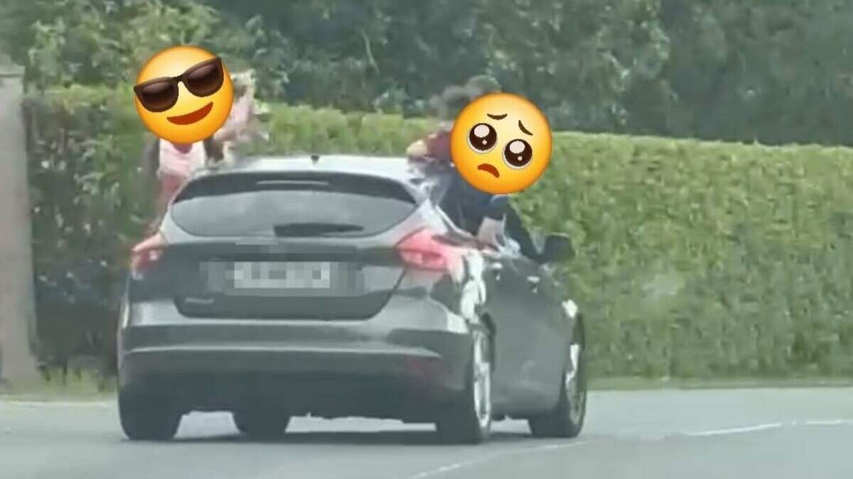 Six People Seen Hanging From Moving Car