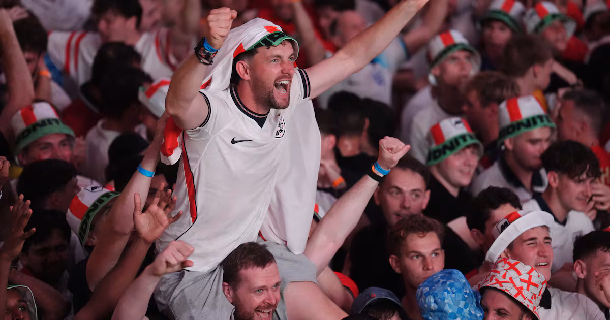 England fans celebrate Gordon's goal in semi-final