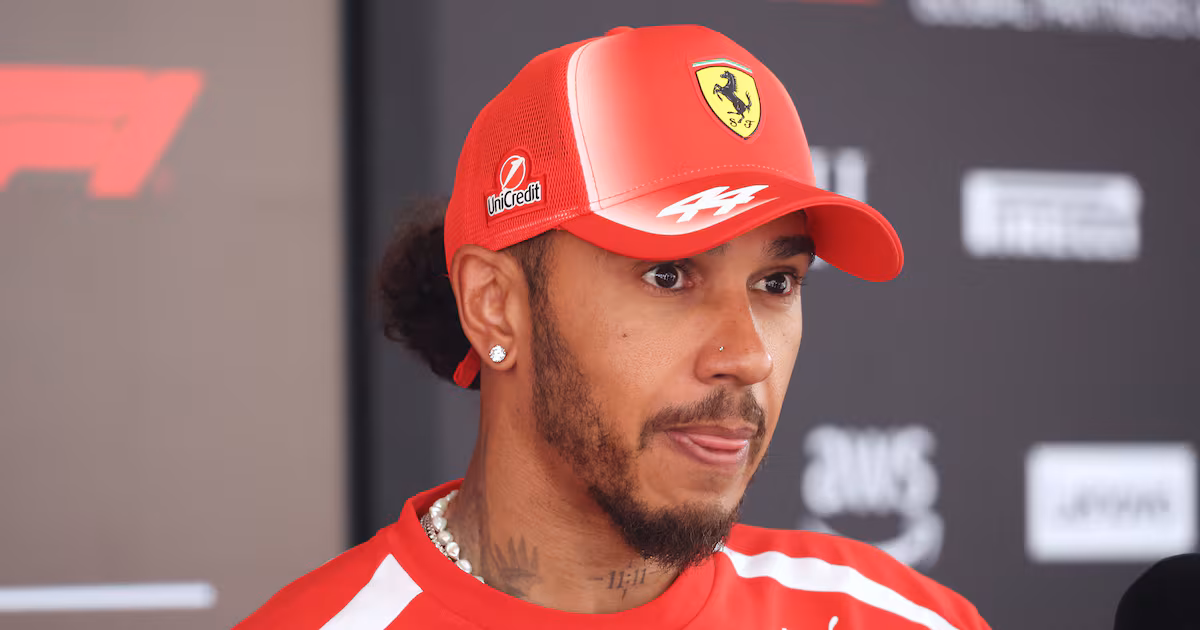 Ferrari fined after Hamilton knocks over mechanic