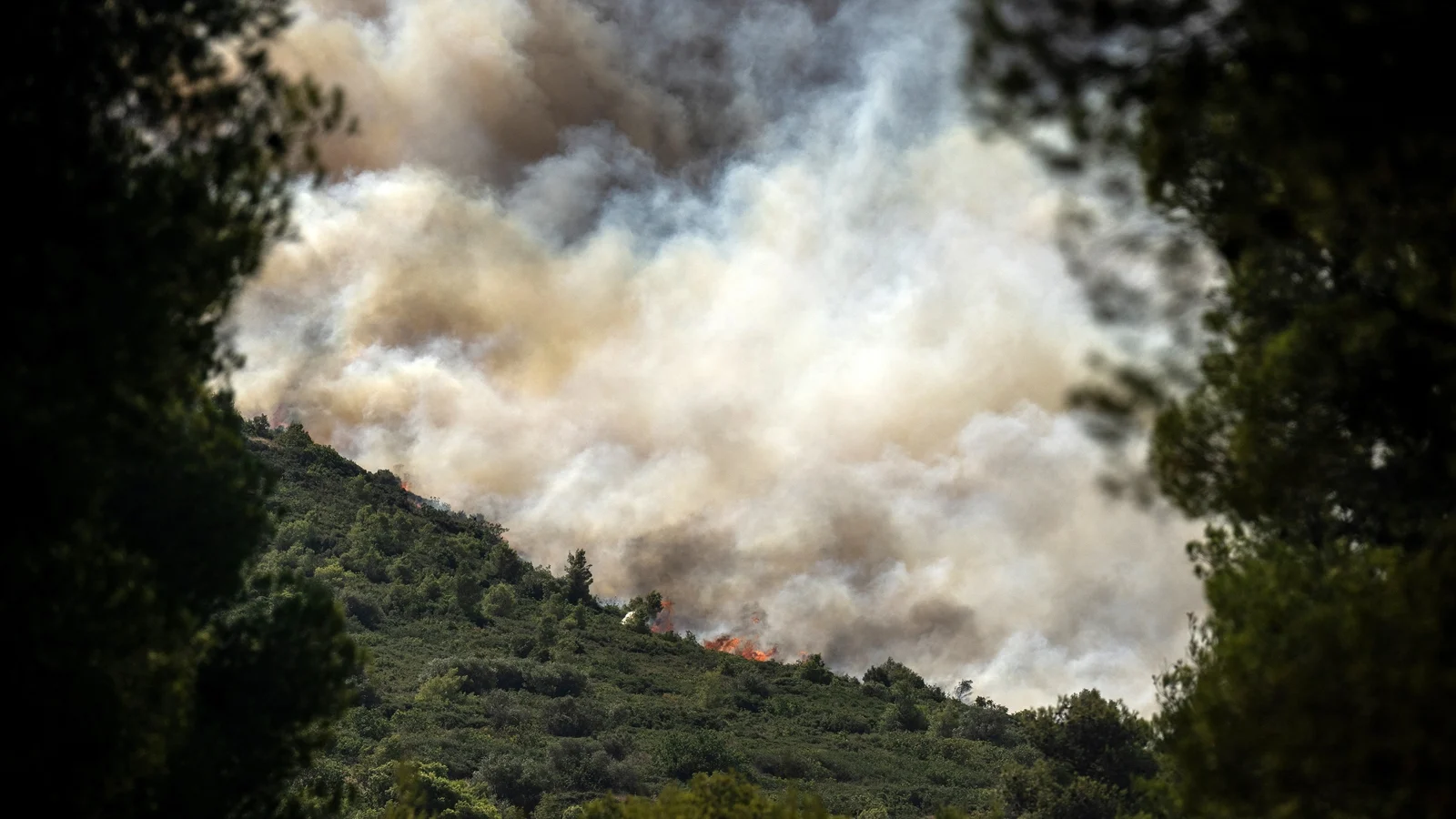 Wildfires Rage Across Greece Amid Emergency Evacuations