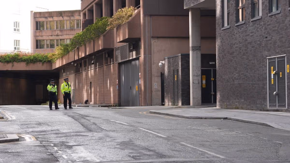 Hunt for escaped prisoner after court van breakout