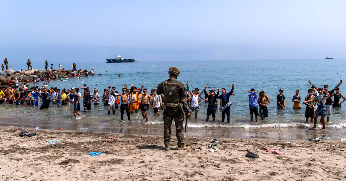 Spain installs sea barrier after migrant crisis