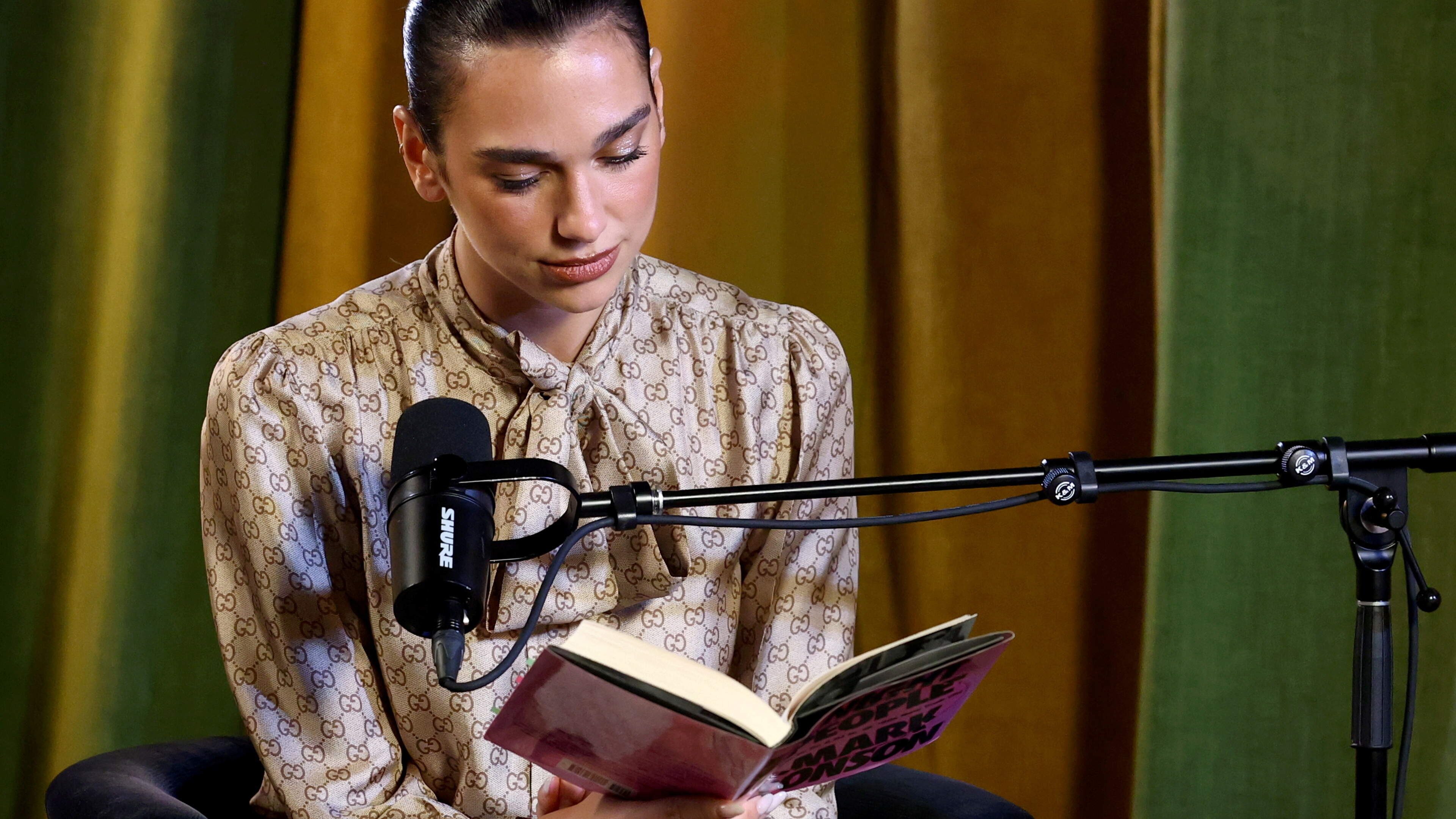 Kara Kennedy defends Dua Lipa's reading habits