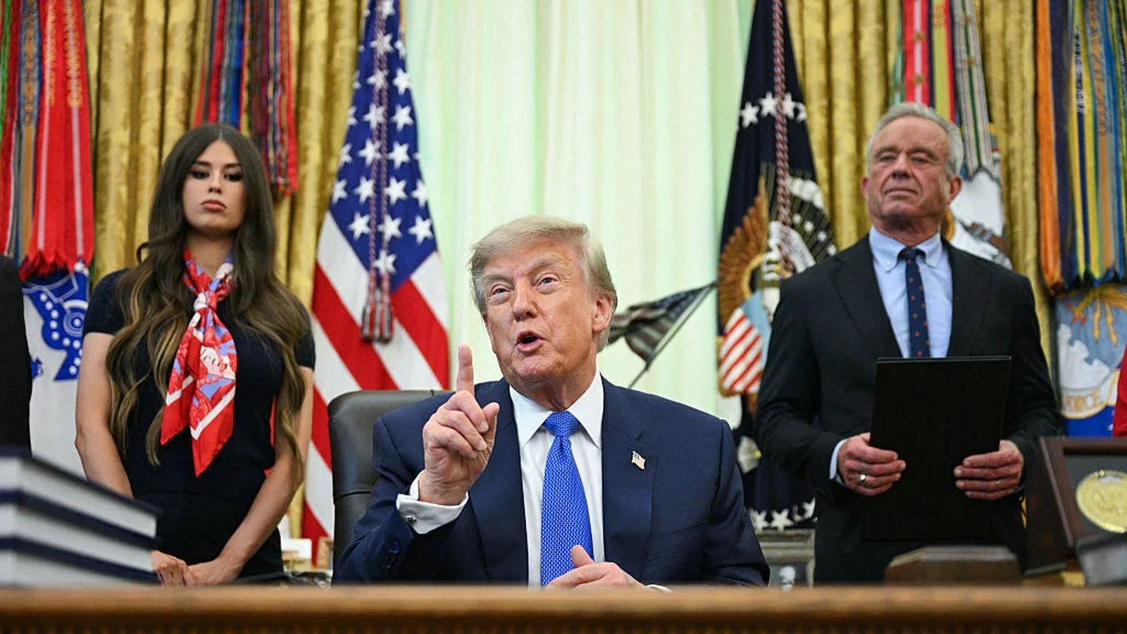 Trump signs order reducing childhood vaccinations